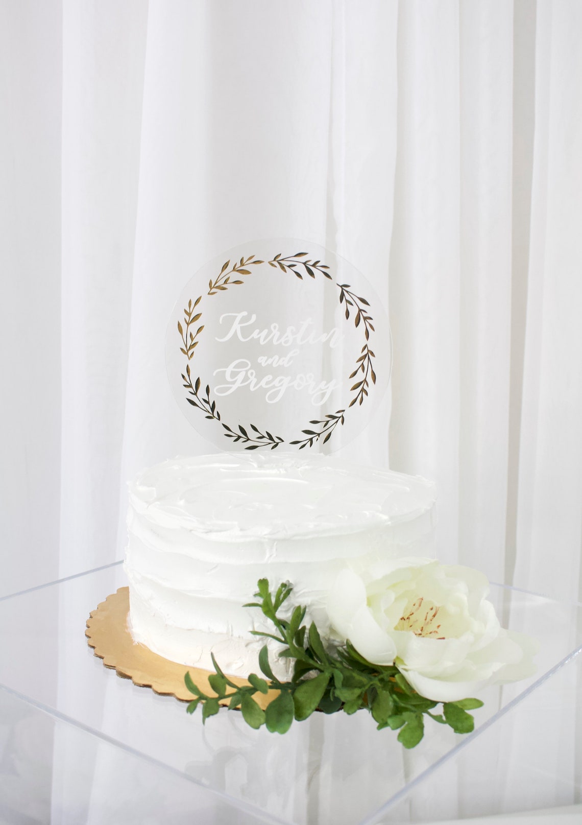 Wedding cake topper. Wooden or acrylic cake topper customized for any of your celebratory needs. Simplistic and elegant designs paired with multiple color schemes to top your celebratory baked goods. thequinnandcompany. www.thequinnandcompany.com