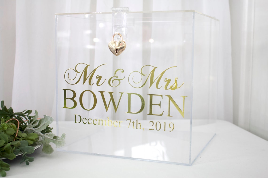 Acrylic card box with lock and key. Customizable designs and fonts made to keep celebratory cards, money or event donations safe and accessible. Place this beautiful card box anywhere your guests gather. thequinnandcompany www.thequinnandcompany.com