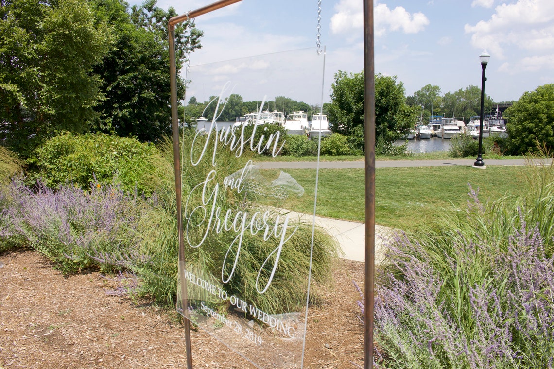 Acrylic event welcome sign. Customizable designs, fonts and dates for weddings, birthdays, bridal/baby showers, retirements or any other event you wish to celebrate. Place this sign at the entrance of your event to welcome your guests in style and simplicity. thequinnandcompany. www.thequinnandcompany.com.