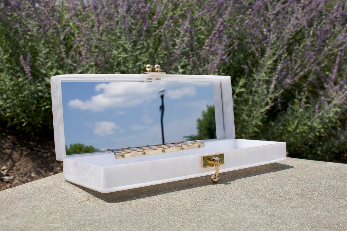 Acrylic clutch. Customizable and personalized for your wedding day. Elegant design with stylish lettering. Durable acrylic and hardware makes this clutch a necessity to carry your necessities. thequinnandcompany. www.thequinnandcompany.com