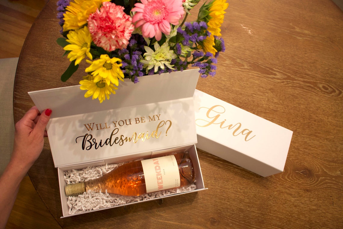 Bridesmaid Proposal Box. Personalized gift box for bridesmaids and/or groomsmen. These boxes come in black or white with your choice of vinyl color lettering and they close magnetically. Box is empty and ready to be filled with your own gifts and goodies for the special people in your life! thequinnandcompany. www.quinnandcompany.com